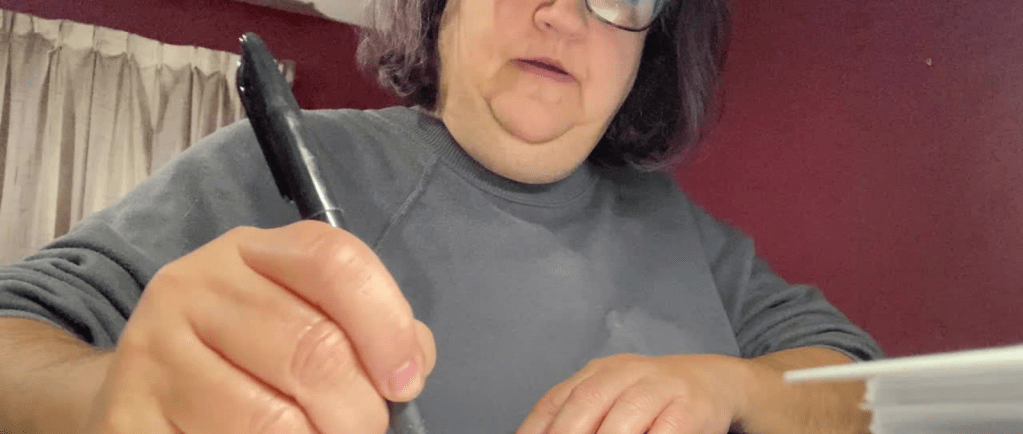 Fiction editor, Lara Zielinsky DBA LZ Edits, hard at work editing to help authors put their best book forward.